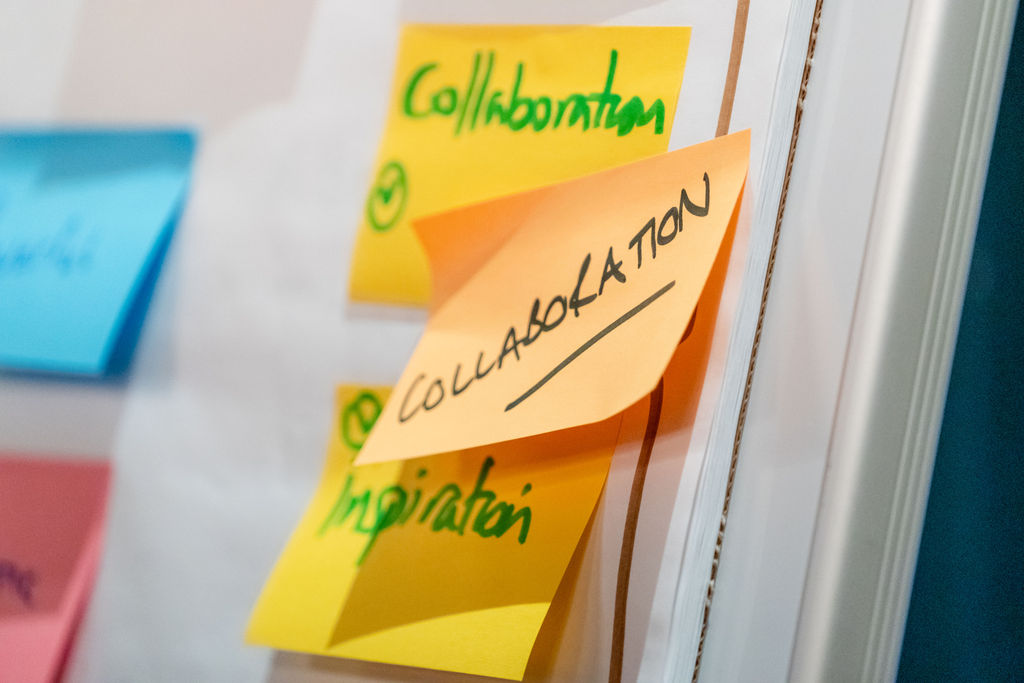 Image of a flipchart with core values written on post-it notes